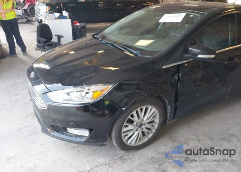 2017 Ford Focus Titanium from USA, damaged, VIN 1FADP3N27HL242650